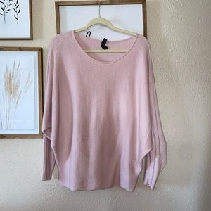 Open neck soft sweater.